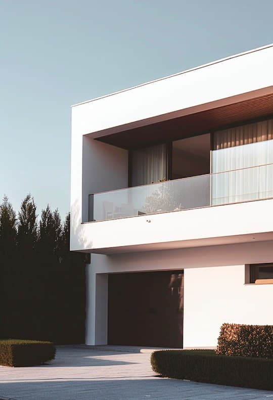 A modern apartment building at dusk